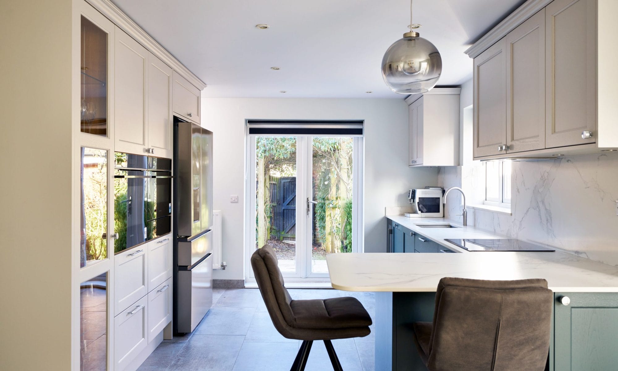 Shaker Kitchen with Dark Green cabinetry and soft neutral wall cabinets