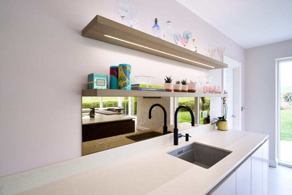 Floating Shelf with LED lighting in kitchen with antique mirror splash back