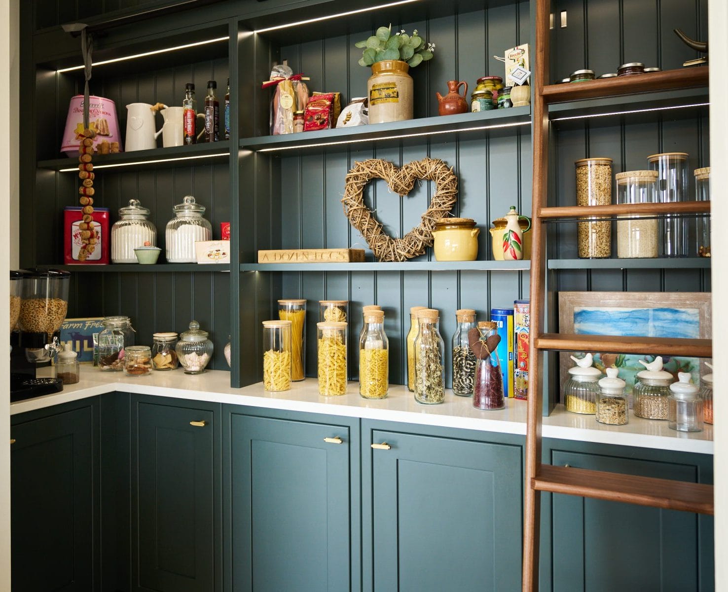 walk in pantry with walnut shelf